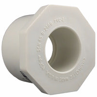 Casquillo reductor de PVC de 1-1/4 pulg. de diámetro x 3/4 pulg. de deslizamiento, cédula 40 de Charlotte Pipe
